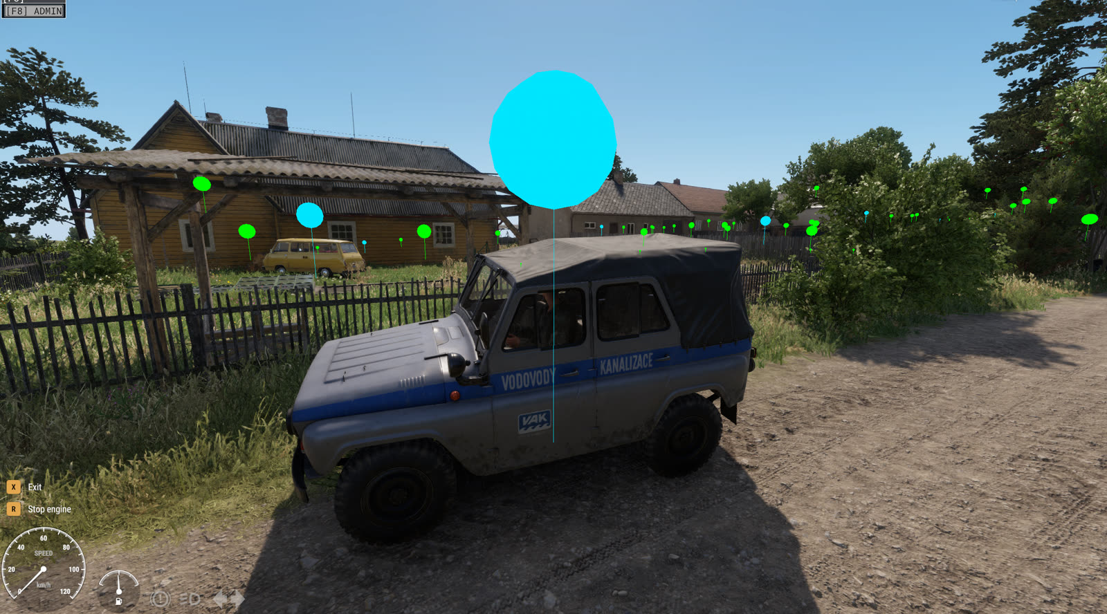 A vehicle ringed by floating loot-spawn debug spheres
